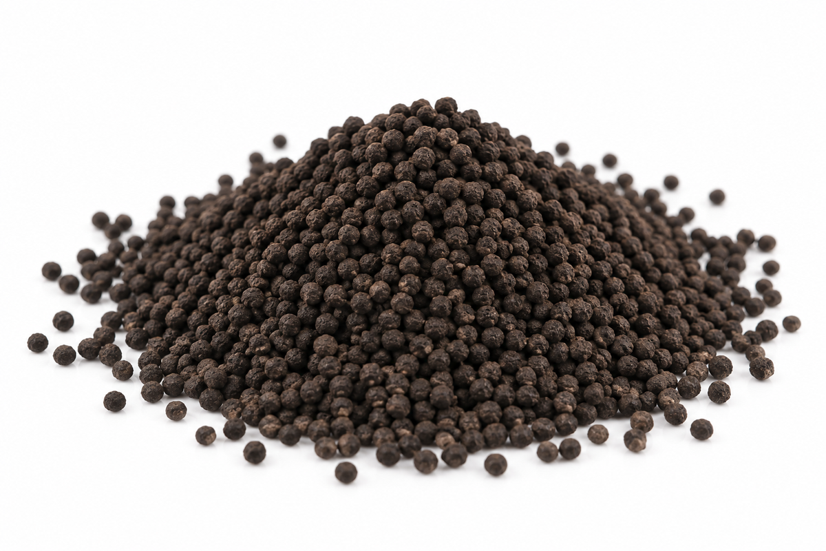 Small, round Fluval Stratum aquarium substrate granules in a dark brown mound on a clean white background, ideal for planted nano aquariums and shrimp tanks.